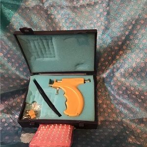 Ear piercings kit.